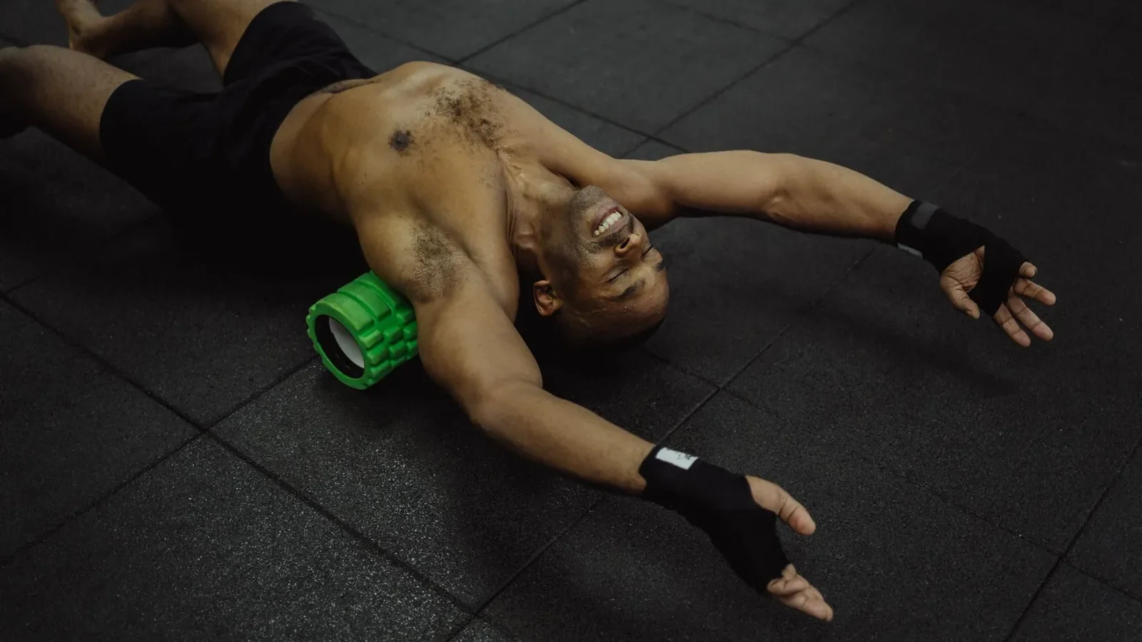 Foam rollers in soft, medium, and high-density arranged by size on a gym floor