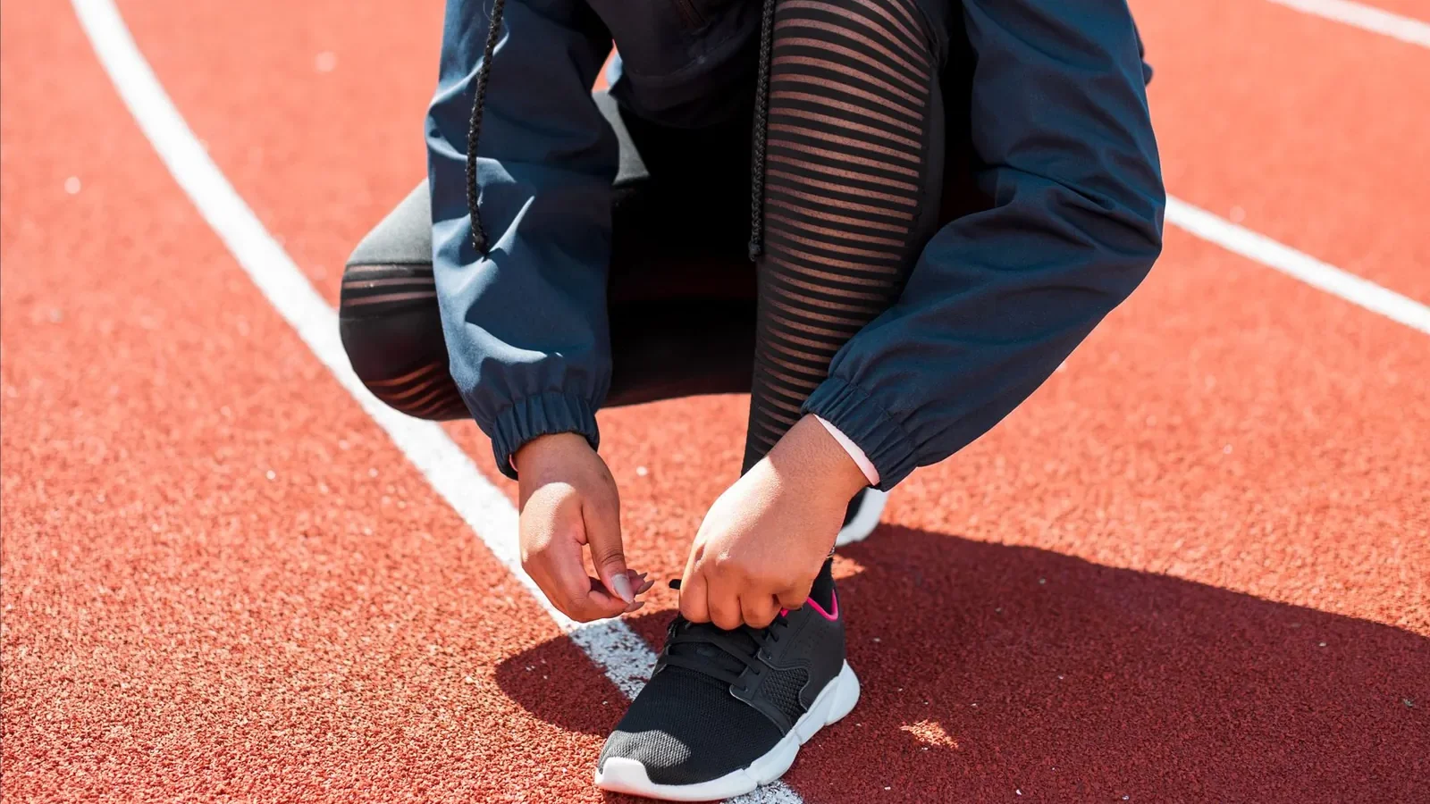 Runner's foot wet-print on cardboard showing low arch for overpronation gait analysis