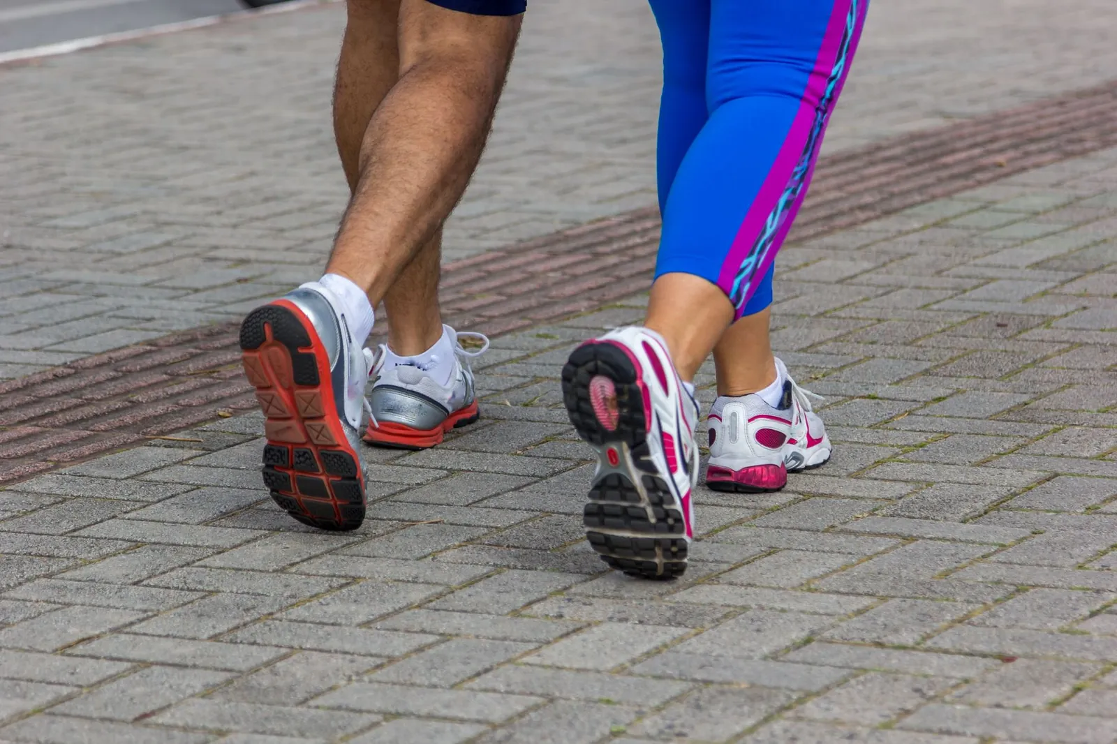 Six beginner running shoes arranged side by side showing cushioning stack and support structure differences