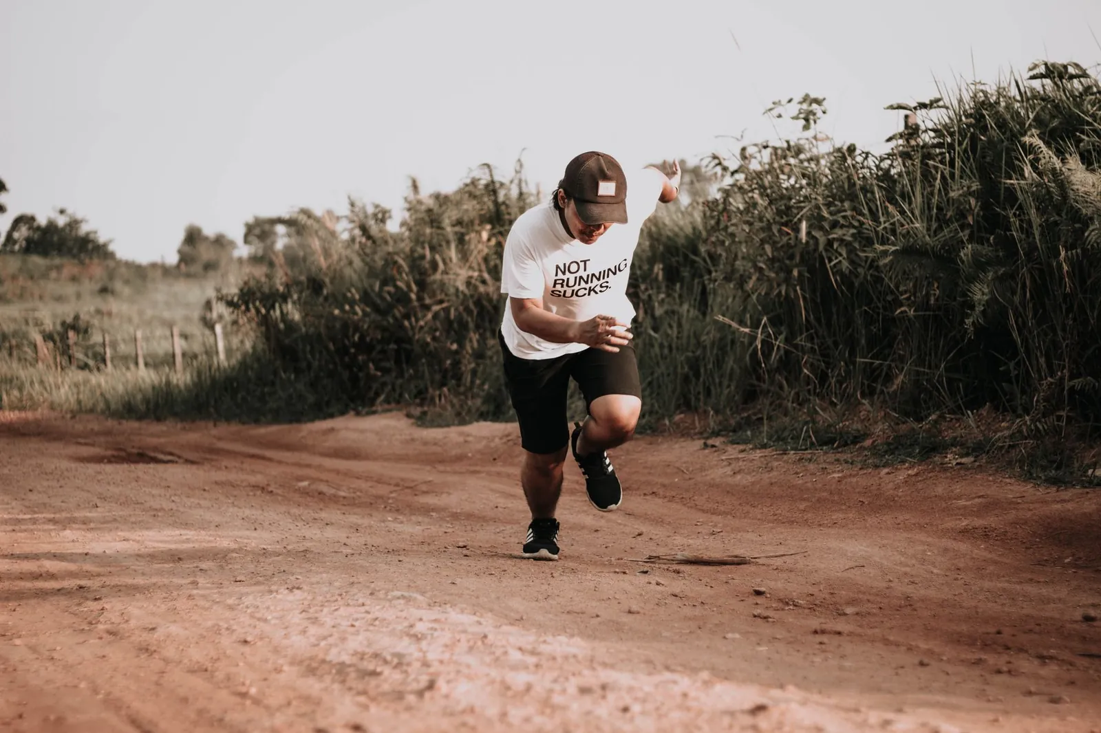 Athlete checking heart rate on a running watch immediately after a tempo run